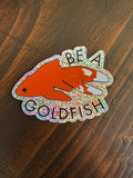 Be a goldfish glittery ted lasso 3" vinyl sticker orange